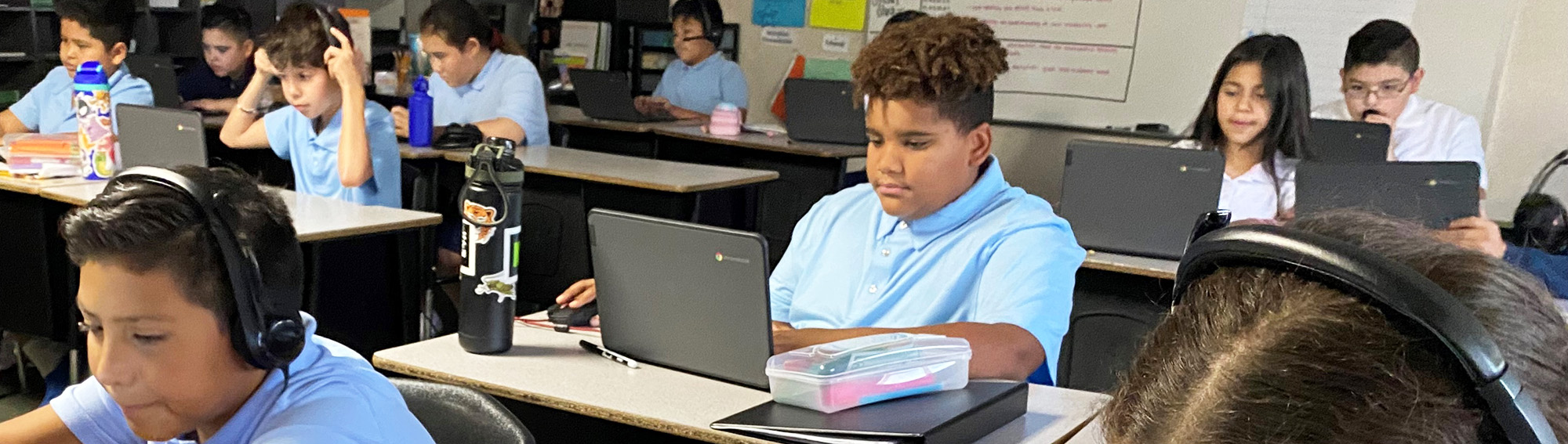 Students focused on learning in the computer lab